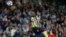 FILE - Usain Bolt goes up for a header during a friendly trial match between the Central Coast Mariners and the Central Coast Select in Gosford, Australia, Aug. 31, 2018.