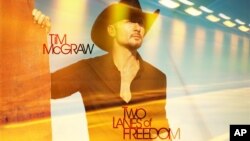 This CD cover image released by Big Machine Records shows "Two Lanes of Freedom," by Tim McGraw. 