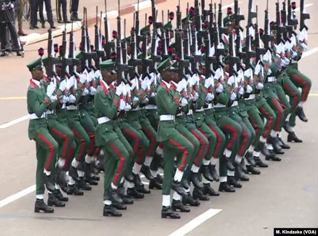 Members of a Nigerian troop guest contingent march in National Day celebrations in Yaounde, Cameroon, May 20, 2018.