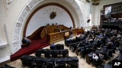 Opposition lawmaker Henry Ramos Allup speaks from the podium during a session of the National Assembly in Caracas, Venezuela, Aug. 7, 2017. 