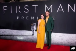 Claire Foy and Ryan Gosling attend the 'First Man' premiere at the National Air and Space Museum of the Smithsonian Institution, October 4, 2018.