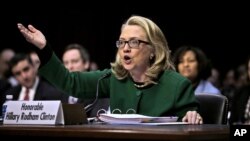 ທ່ານນາງ Hillary Clinton, ອະດີດລັດຖະມົນຕີການຕ່າງປະເທດ ສະຫະລັດ ໃຫ້ການເປັນພະຍານໃນລັດຖະສະພາ ທີ່ນະຄອນຫຼວງ Washington, 23 ມັງກອນ, 2013, ກ່ອນການພິຈາລະນາກ່ຽວກັບ ເຫດການໂຈມຕີທາງການທູດ ສະຫະລັດ ນະຄອນ Bengazi ປະເທດ ລີເບຍ ໂດຍ ຄະນະກຳມະການສະມາຊິກສະພາ ພົວພັນຕ່າງປະເທດ.