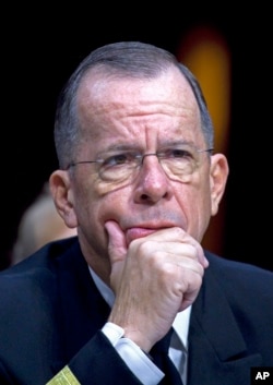 FILE - Then-Joint Chiefs Chairman Admiral Michael Mullen testifies on Capitol Hill in Washington, Sept. 22, 2011, before a Senate committee.
