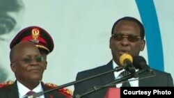 Rais John Magufuli na Mwenyekiti wa Chadema Freeman Mbowe