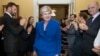 Britain’s May Names New Cabinet, Vows to Stay on as PM