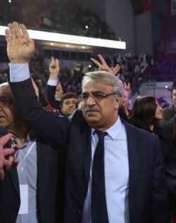 Co-chair of the pro-Kurdish Peoples' Democratic Party Mithat Sancar waves as he attends the 4th Ordinary Peoples' Democratic Party congress in Ankara on Feb. 23, 2020.
