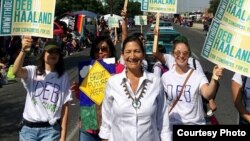 FILE - A photo shows 2018 Congressional candidate Deb Haaland, Democrat and a member of the San Felipe Pueblo with supporters at New Mexico State Fair in September 2017. 