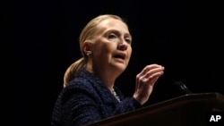 Secretary of State Hillary Rodham Clinton gestures as she gives a speech Thursday, Dec. 6, 2012, at Dublin City University in Dublin, Ireland.