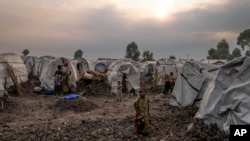 People displaced by the ongoing fighting gather at refugee camp on the outskirts of Goma, Democratic Republic of Congo, on July 11, 2024.