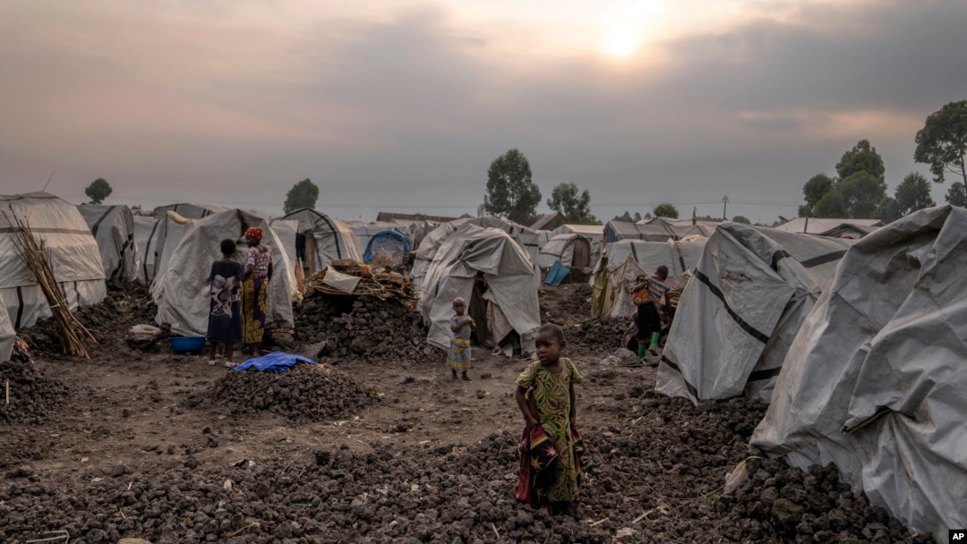 People displaced by ongoing fighting gather at a refugee camp on the outskirts of Goma, Democratic Republic of the Congo, on July 11, 2024.
