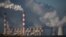 FILE PHOTO: Smoke and steam billow from Belchatow Power Station, Europe's largest coal-fired power plant powered by lignite, operated by Polish utility PGE, in Kamiensk