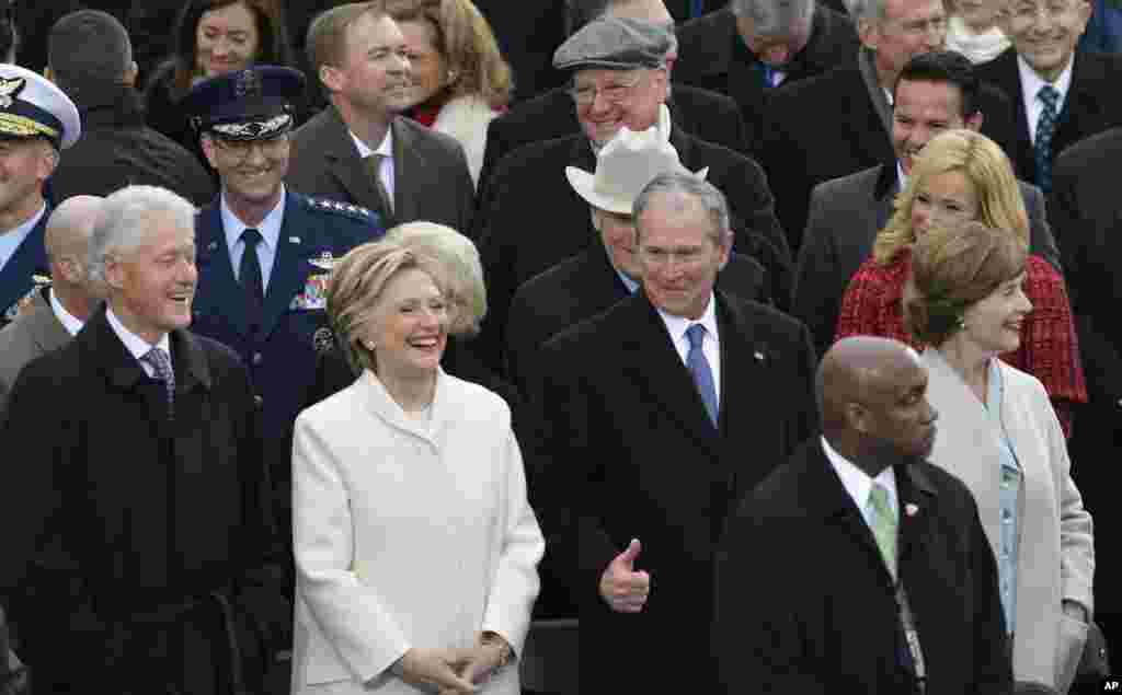 Former President George W. Bush, right, his wife Laura, Former Secretary of State Hillary Clinton and Former President Bill Clinton wait for the 58th Presidential Inauguration for President-elect Donald Trump at the U.S. Capitol in Washington, Jan. 20, 20