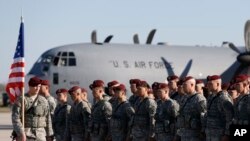 FILE - Members of the U.S. Army 173rd Airborne Brigade attend a welcome ceremony upon their arrival at a Lithuanian air force base in Siauliai, Lithuania, April 26, 2014. Troops from the brigade will be among those participating in exercises Rapid Trident