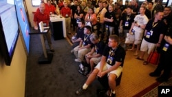 FILE - Hackers and digital security personnel attend the annual Black Hat conference for digital self-defense in Las Vegas, Aug. 4, 2011. At that time, a security researcher who is diabetic identified flaws that could allow an attacker to remotely control insulin pumps; now, Johnson & Johnson has warned that its pumps could be hacked.