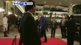 VOA60 America - President Donald Trump and Russian President Vladimir Putin talk briefly during opening photo at APEC Summit in Vietnam