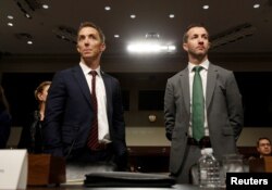 FILE - Keith Enright, chief privacy officer at Google, and Damien Kieran, global data protection officer and associate legal director at Twitter, stand before testifying before a Senate panel on Capitol Hill, in Washington, Sept. 26, 2018.