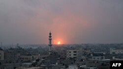FILE - An explosion is seen in Khan Yunis as battles between Israel and Hamas militants continue, in this picture taken from Rafah in the southern Gaza Strip, on Dec. 5, 2023.