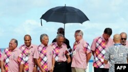 Australian Prime Minister Scott Morrison, third from right, talkes with other leaders at the Pacific Islands Forum in Tuvalu, Aug. 15, 2019. 