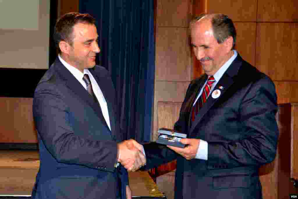 Envoys of Albanian president presented an individual award to former Albanian Service broadcaster Elez Biberaj, who is now Director of the VOA's Eurasia Division