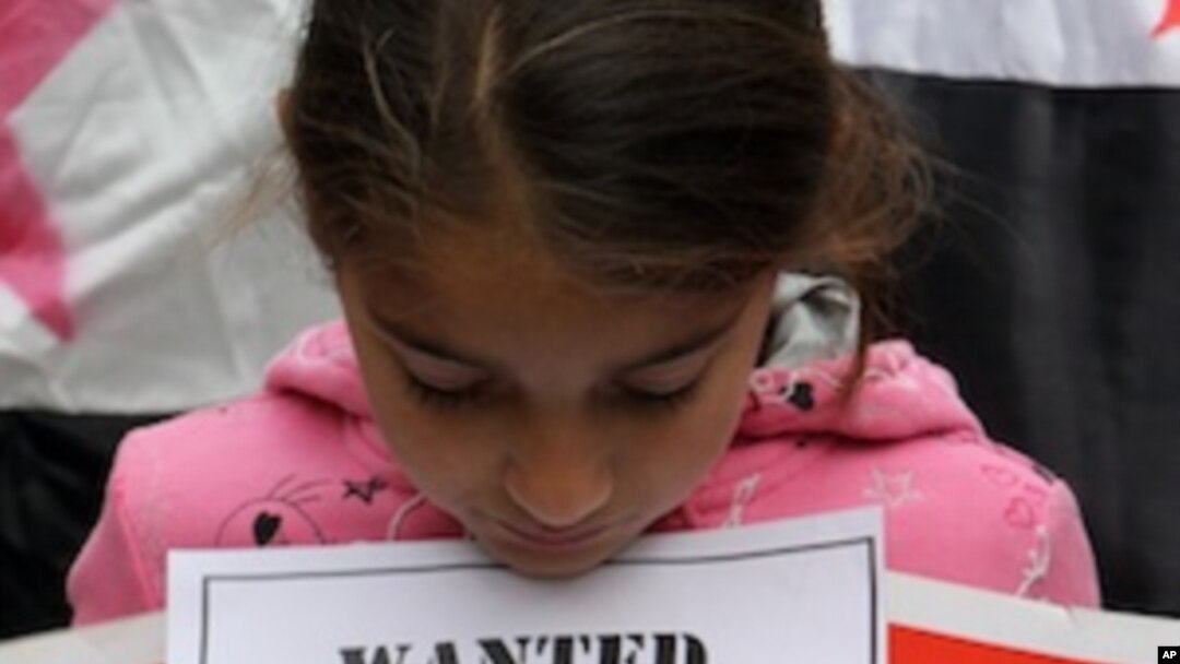 A young Syrian Kurd protests outside the Arab League offices in an eastern neighborhood of the Lebanese capital Beirut on December 25, 2011.