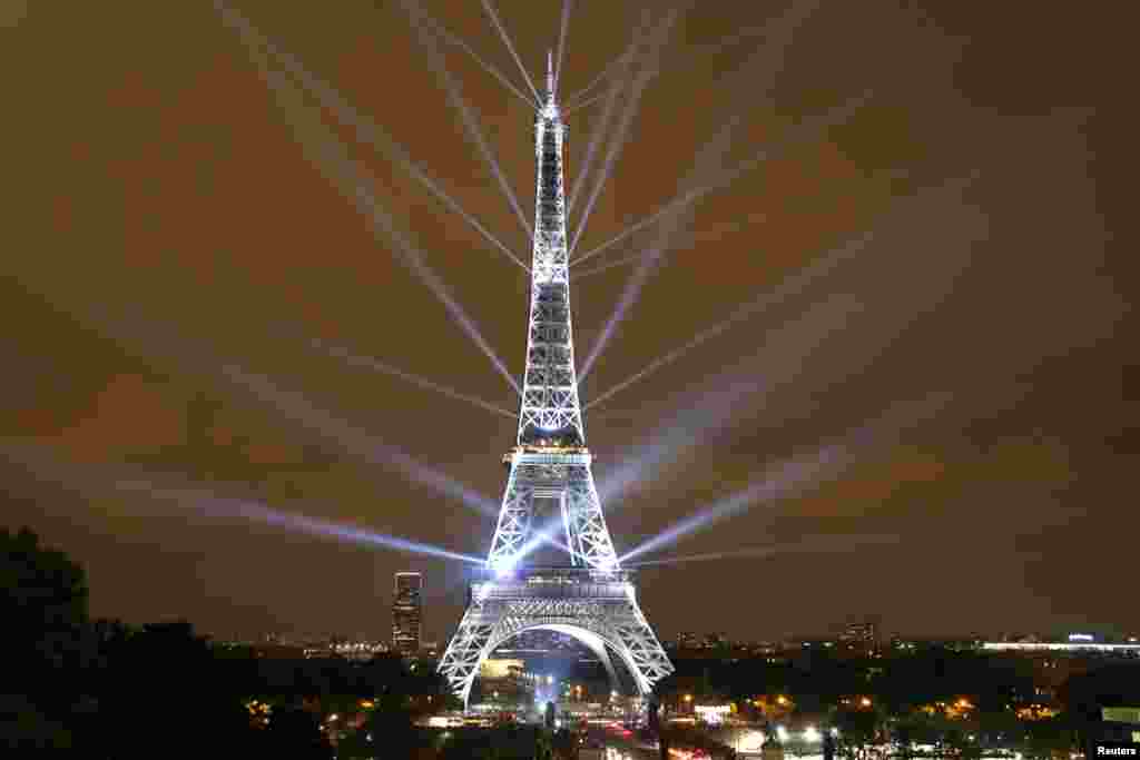 Lighting designers Motoko Ishii and Akari-Lisa Ishii present a two-day special light show on the Eiffel Tower to celebrate the Japanese cultural season and 160 years of diplomatic relations between France and Japan in Paris, France, September 13, 2018.