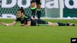 Le Gallois Gareth Bale ici lors de la demi-finale de l'Euro-2016 entre le Portugal et le Pays de Galles, au grand stade de Décines-Charpieu, près de Lyon, France, le 6 juillet 2016.