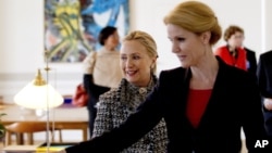 Danish Prime Minister Helle Thorning-Schmidt welcomes U.S. Secretary of State Hillary Rodham Clinton to Copenhagen.