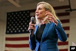 FILE - Seventh District Congressional candidate Abigail Spanberger speaks during a rally in Richmond, Va., Nov. 5, 2018.