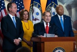 House Intelligence Committee Chairman Adam Schiff, Speaker of the House Nancy Pelosi, House Judiciary Committee Chairman Jerrold Nadler, and House Oversight and Reform Committee Chairman Elijah Cummings, speak to the press after the back-to-back hearings with former special counsel Robert Mueller, July 24, 2019, in Washington.