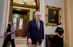 Senate Republican Minority Leader Mitch McConnell walks to the chamber late Saturday afternoon, Aug. 7, 2021, after the Senate voted to advance the $1 trillion bipartisan infrastructure bill, at the Capitol in Washington, Aug. 7, 2021.