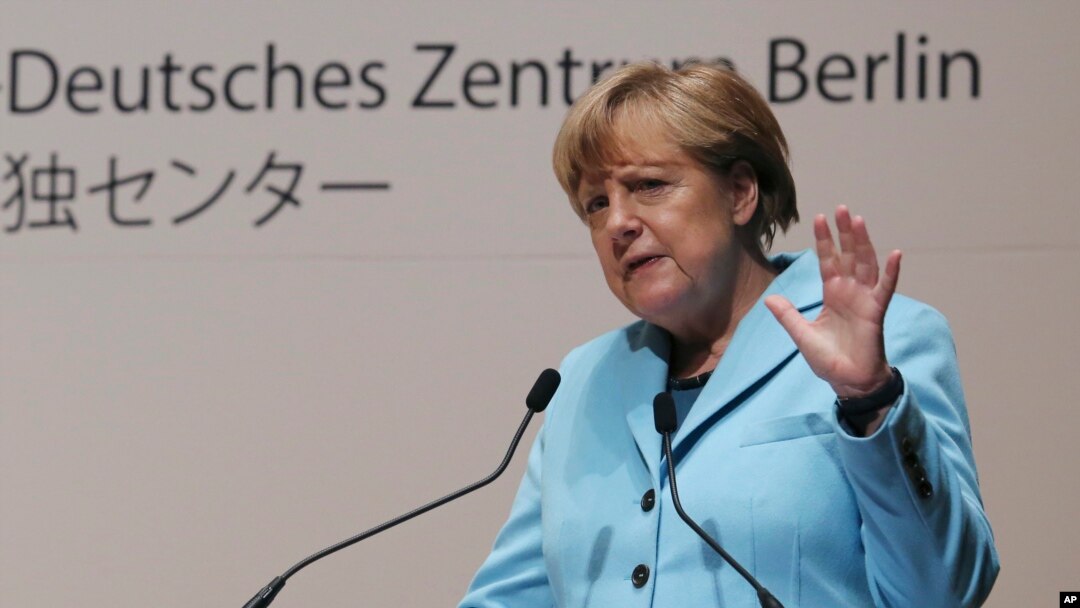 Kanselir Jerman Angela Merkel berbicara dalam kuliah di kantor pusat Asahi Shimbun di Tokyo (9/3). (AP/Koji Sasahara, Pool)