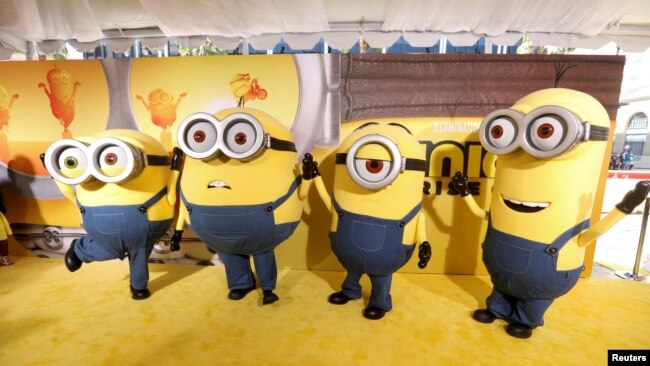 FILE - People dressed as the characters Bob, Otto, Stuart and Kevin pose on the red carpet for "Minions: The Rise of Gru" at the TCL Chinese Theater in Los Angeles, California, U.S., June 25, 2022. (REUTERS/David Swanson/File Photo)