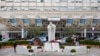 A statue of Pope John Paul II is seen Feb. 17, 2025, in front of the Agostino Gemelli Polyclinic in Rome, where Pope Francis is being treated for a respiratory tract infection.