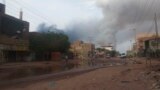 FILE: Smoke rises over Khartoum, Sudan, Wednesday, June 7, 2023. Since then, fighting between the Sudan army and the Rapid Support Forces has continued, though paused briefly by cease-fires that don't hold.