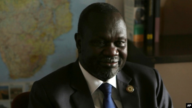 FILE - South Sudan rebel leader Riek Machar speaks in an interview with The Associated Press in Johannesburg, on Oct. 20, 2016.