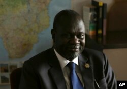 FILE - South Sudan rebel leader Riek Machar speaks in an interview with The Associated Press in Johannesburg, on Oct. 20, 2016.