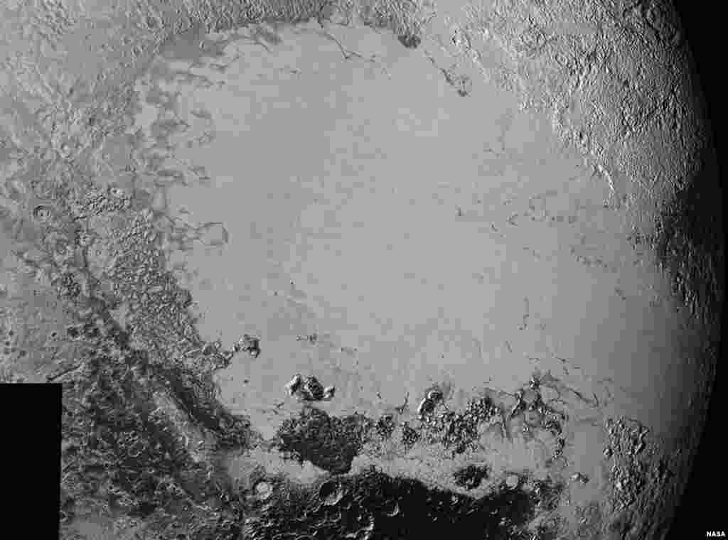 Mosaic of high-resolution images of Pluto, sent back from NASA's New Horizons spacecraft from Sept. 5 to 7, 2015. The image is dominated by the informally-named icy plain Sputnik Planum, the smooth, bright region across the center. This image also features a tremendous variety of other landscapes surrounding Sputnik. 