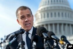 FILE - Hunter Biden, son of U.S. President Joe Biden, talks to reporters at the U.S. Capitol, in Washington, Decenber 13, 2023.