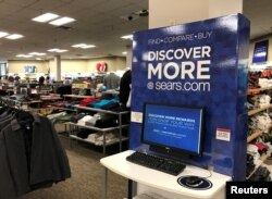 FILE - An online shopping kiosk is shown inside a Sears department store in La Jolla, California, March 22, 2017.