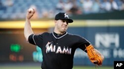 Miami Marlins starting pitcher Jose Fernandez throws in the first inning of a baseball game against the Atlanta Braves in Atlanta, Wednesday, Sept. 14, 2016.