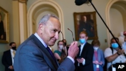 Senate Majority Leader Chuck Schumer, D-NY, updates reporters on the latest action in the infrastructure negotiations between Republicans and Democrats, at the Capitol in Washington, July 28, 2021.
