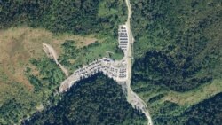 This handout satellite photo taken Nov. 1, 2020, and obtained from Planet Labs, Inc. Jan. 20, 2021, shows a newly-constructed Chinese village in an area along the disputed India-China border.
