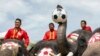 Beberapa ekor gajah bermain sepakbola untuk menyambut acara Piala Dunia Sepakbola dan kampanye menolak perjudian di kota kuno Ayutthaya, Thailand.