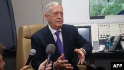 US Defense Secretary Jim Mattis aboard his official aircraft on the first leg of a trip which will take him to China, South Korea and Japan, June 24, 2018