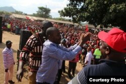 FILE: In this Sunday, March 4, 2018 photo, MDC-T party leader Nelson Chamisa addresses supporters, at a rally in Chinhoyi about 140 kilometres west of the capital Harare. Ahead of Zimbabwe's crucial elections this year, the biggest opposition party has been facing some internal squabbles though attracting thousands of people at public rallies.