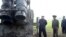 FILE - North Korean leader Kim Jong Un attends the testing of a super-large multiple rocket launcher in North Korea, in this undated photo released Sept. 10, 2019 by North Korea's Korean Central News Agency. 