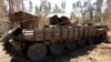 A tank destroyed during fighting between the Ethiopian National Defense Force (ENDF) and the Tigray People's Liberation Front (TPLF) forces is seen on a roadside in Gashena, Amhara region, Ethiopia Dec. 7, 2021.