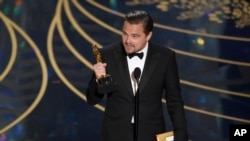 Leonardo DiCaprio accepts the award for best actor in a leading role for “The Revenant” at the Oscars, Feb. 28, 2016, at the Dolby Theatre in Los Angeles. DiCaprio mentioned the issue of climate change during his speech.