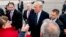 President Donald Trump greets guests on the tarmac as he arrives at Greenbrier Vally Airport, in Lewisburg, W.Va., Feb. 1, 2018, to speak at the 2018 House and Senate Republican Member Conference at The Greenbrier.