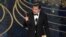 Leonardo DiCaprio accepts the award for best actor in a leading role for “The Revenant” at the Oscars, Feb. 28, 2016, at the Dolby Theatre in Los Angeles. DiCaprio mentioned the issue of climate change during his speech.